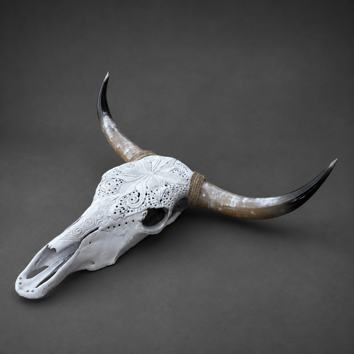 The Luminary artisanal carved cattle skull – left angle view