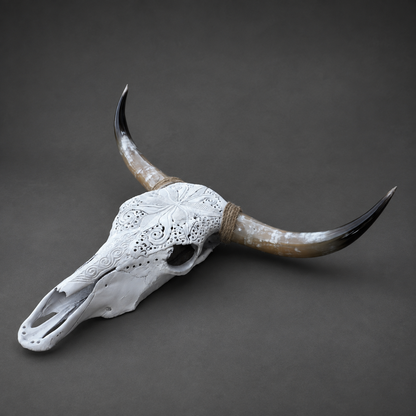 The Luminary artisanal carved cattle skull – left angle view