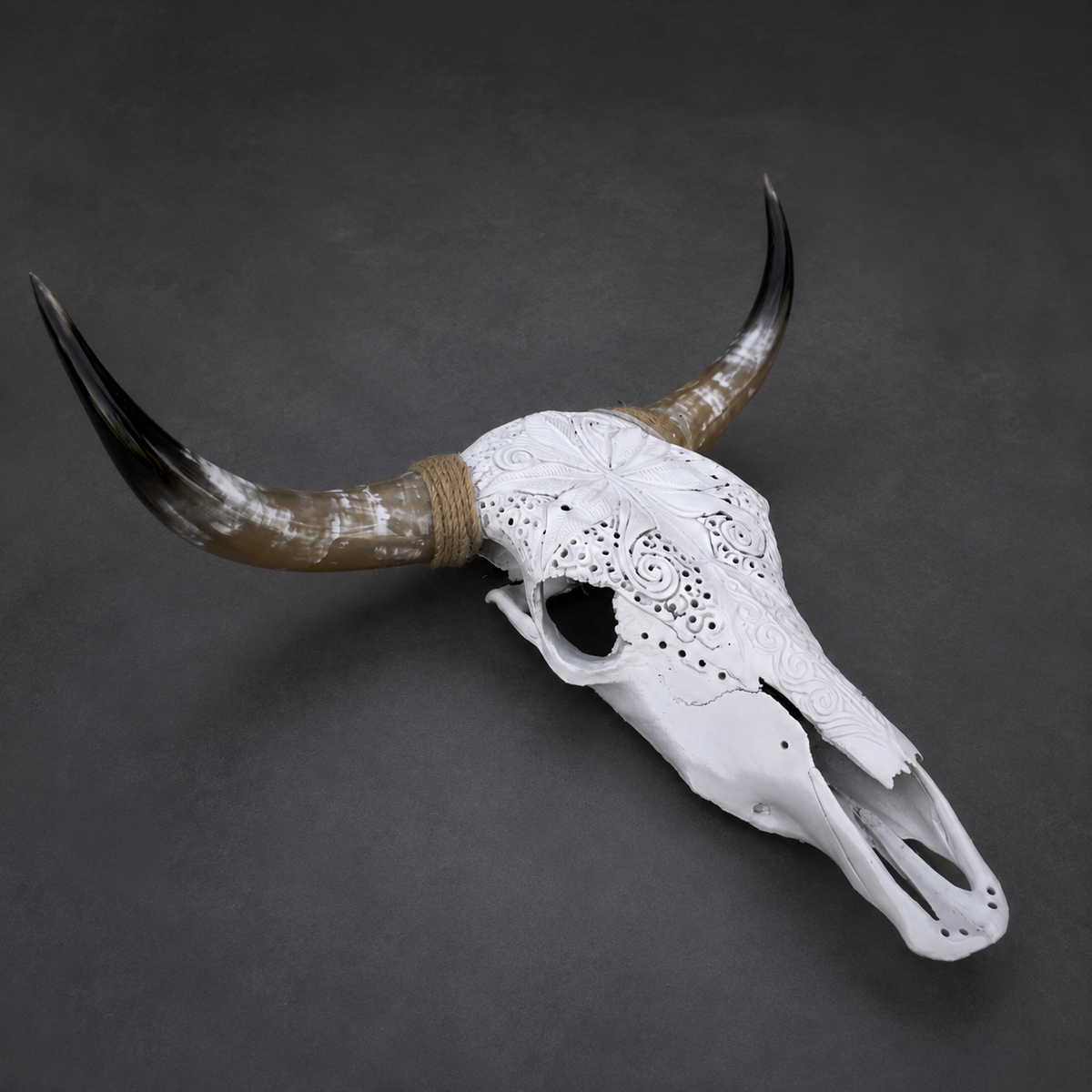 The Luminary artisanal carved cattle skull – right angle view